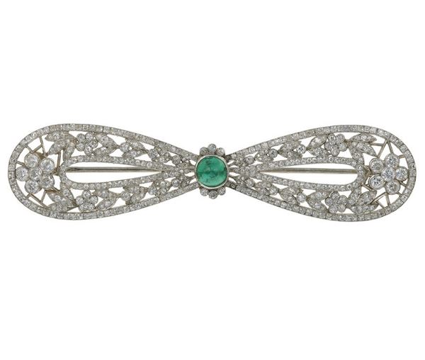 Diamond, emerald and gold bow brooch