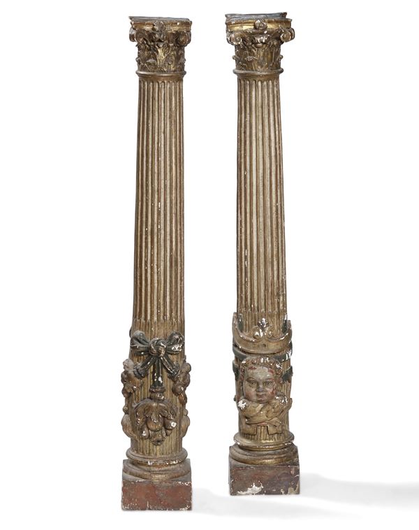 Coppia di colonne in legno intagliato e dorato. XVIII secolo