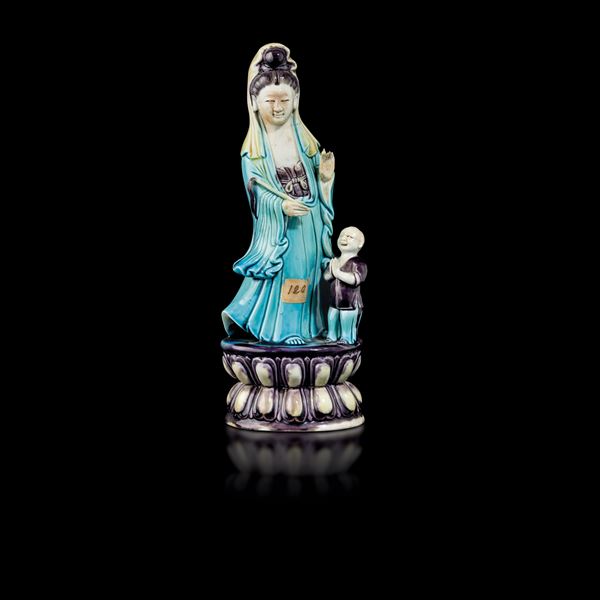 A porcelain Guanyin with child, China