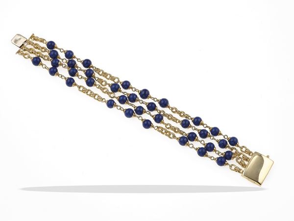 Multi-row blue paste and gold bracelet