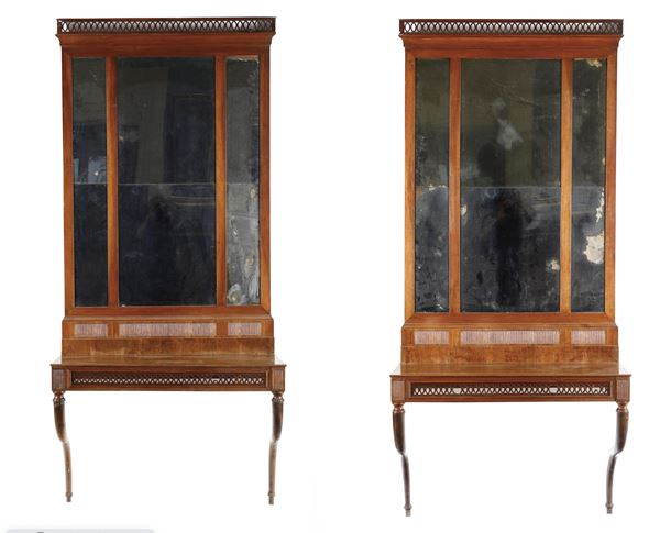 Coppia di consoles con specchiere. XIX secolo