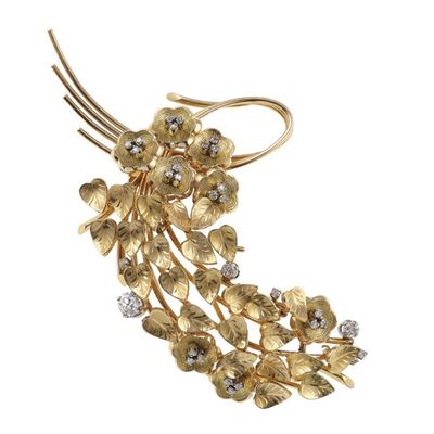 Spilla con diamanti in montatura in oro giallo 750/1000 con effetto tremblant