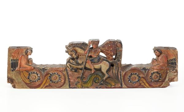 Porzione di carretto siciliano in legno intagliato e dipinto. XX secolo