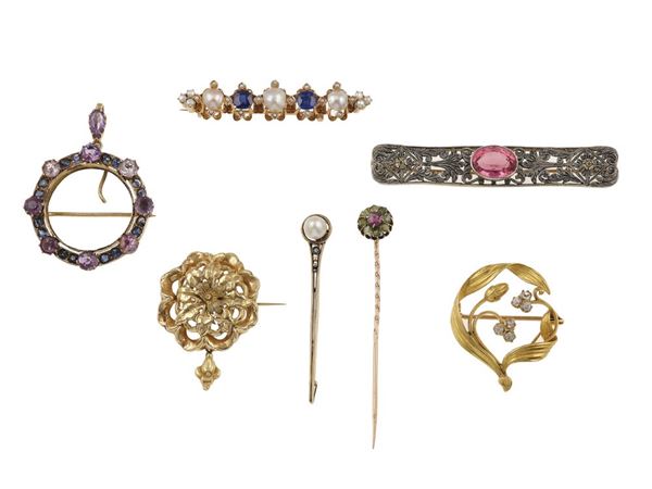 Group of five brooches, one pendant brooch and one pin