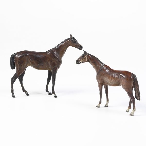 Due cavallini in bronzo, uno con firma incisa “Real Vienna bronze”