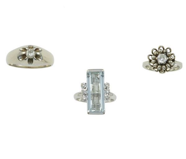 Three diamond, aquamarine and diamond rings