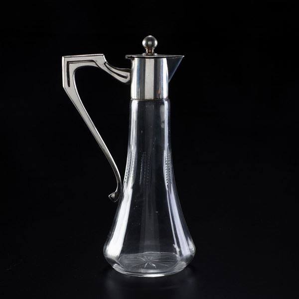 Caraffa con finimenti in argento. Argentiere Cesa, Alessandria. XX secolo