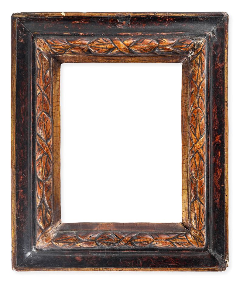 Piccola cornice in legno scolpito, dorato e marmorizzato. Italia centrale XVII secolo  - Auction Antique Frames - Cambi Casa d'Aste
