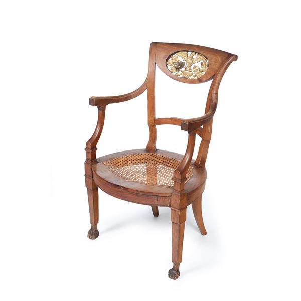 Poltrona in legno e cannetè. XIX secolo