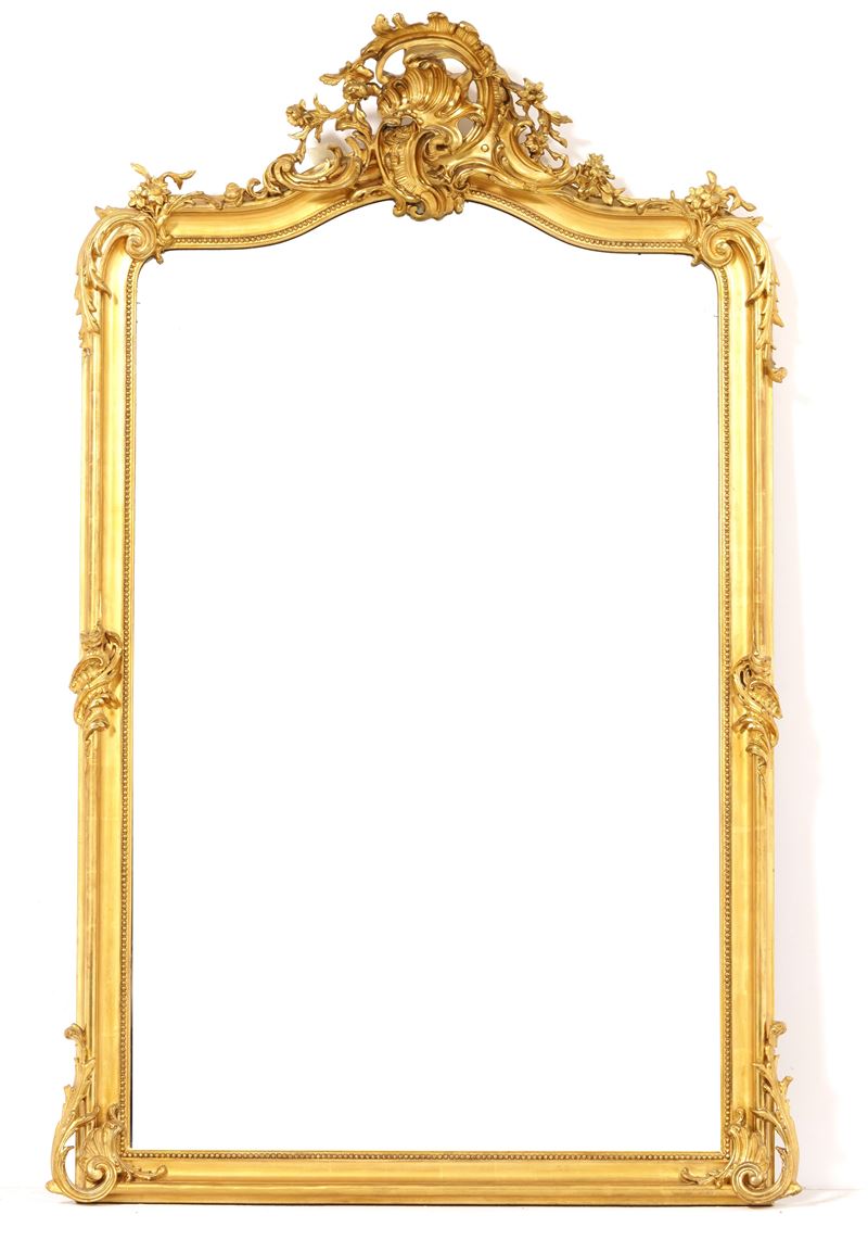 Specchiera in legno intagliato e dorato. XX secolo  - Auction Palazzo Pugliese: Antique style furniture - Cambi Casa d'Aste