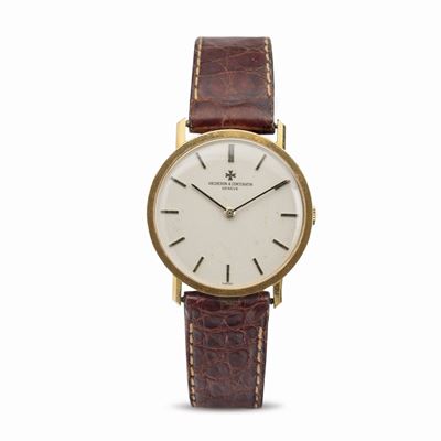 Fine ed Elegante Patrimony Ref 7811 in Oro Giallo 18k, Quadrante Argentè con Indici a Bastone App...