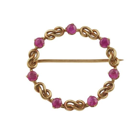 Gold and ruby brooch