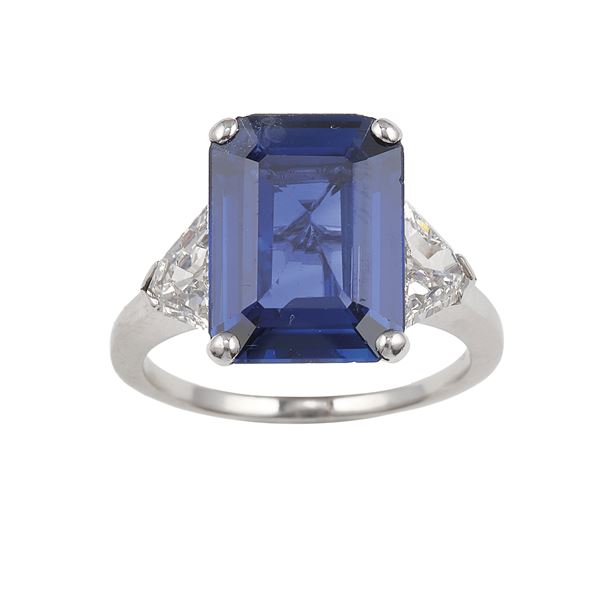 Sri Lanka sapphire weighs 5.212 carts with no evidence of heat enhancement, diamond and platinum ring.  [..]