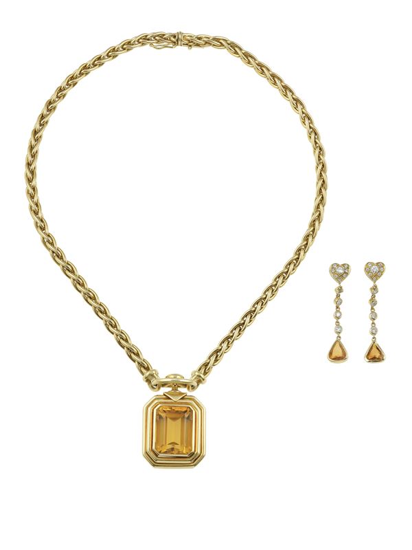 Citrine and gold pendant signed Fasano. Earrings en suite