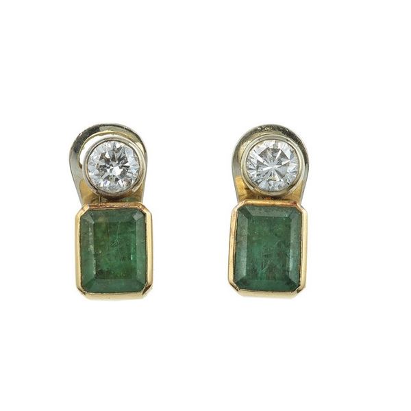 Pair of diamond and emerald earrings
