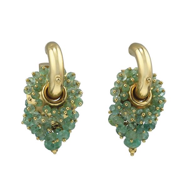 Pair of emerald and gold earrings