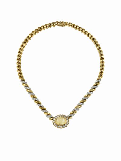Sabbadini, Girocollo in oro giallo 750/1000 con corindone cabochon e diamanti