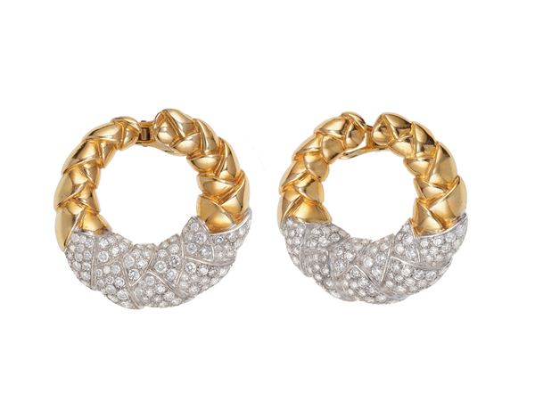 Pair of gold and diamond earrings