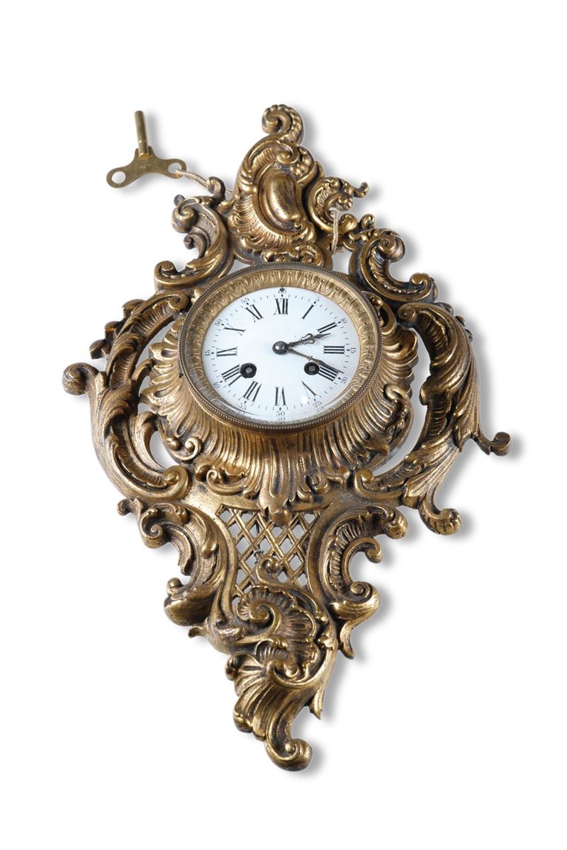 Orologio tipo Cartel in bronzo. XIX-XX Secolo  - Auction Pendulum and clocks - Cambi Casa d'Aste