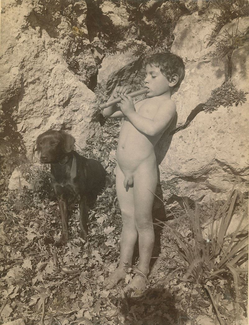 Wilhelm Von Gloeden : Untitled (Boy playing the flute)  (1900s)  - albumen print - Auction Photography - Cambi Casa d'Aste