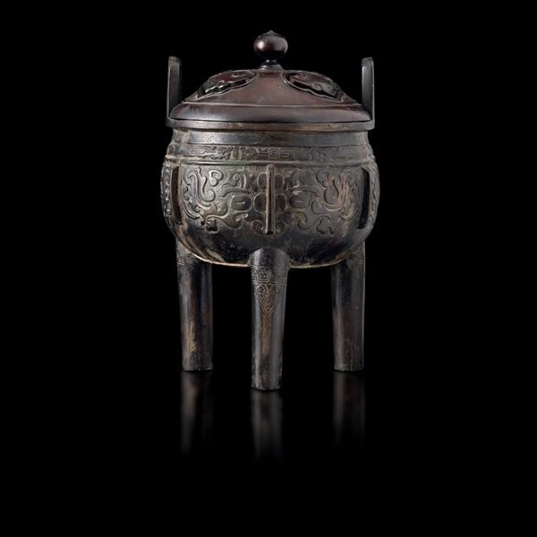 A bronze tripod censer, China, 1600s