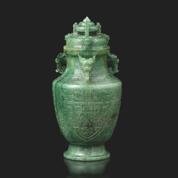 Apple-green jade potiche carved with geometric decorations and handles in the shape of fantastic animals, China, Qing Dynasty, 19th century
