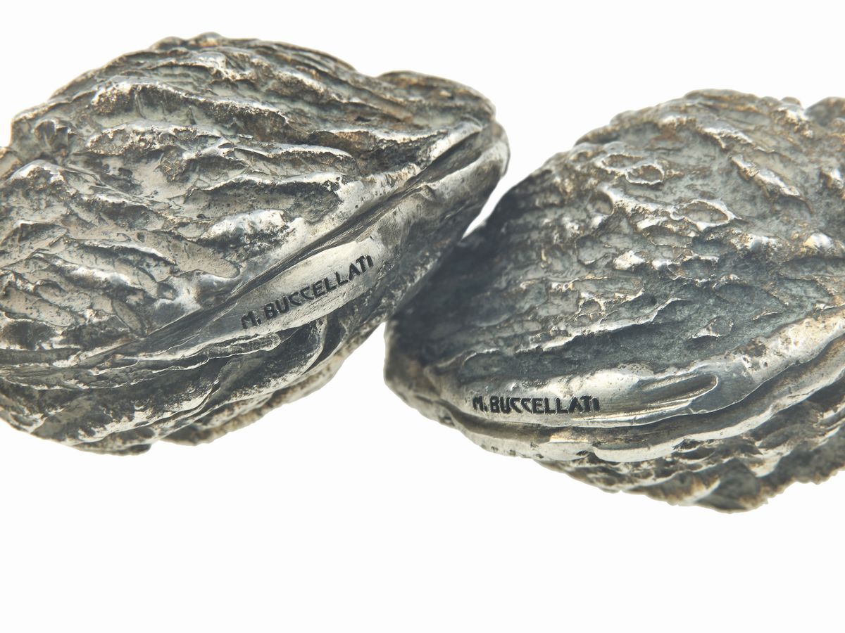 Buccellati, Lotto di frutta secca in argento (composto da nove oggetti)