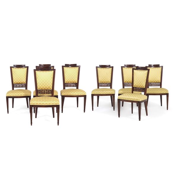 Otto sedie in legno intagliato. XIX secolo