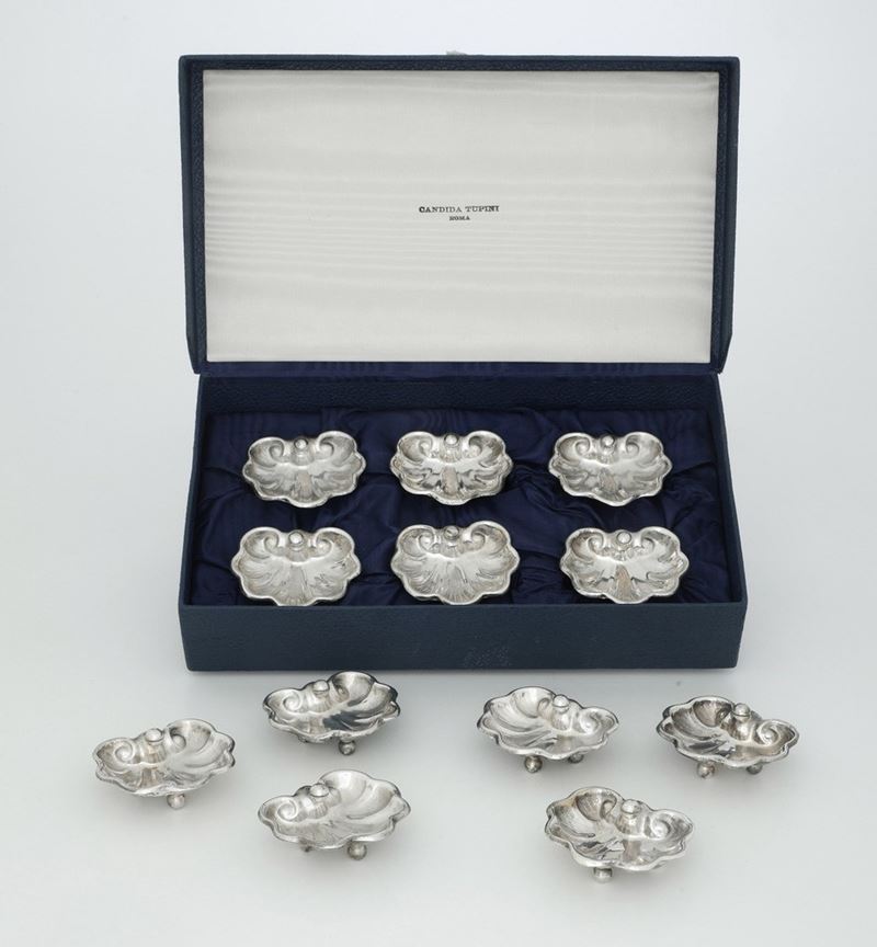 Dodici segnaposto in metallo argentato. XX secolo  - Auction Silverware - Cambi Casa d'Aste