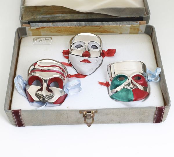 Tre maschere in argento e smalto. Argenteria Ganci Milano