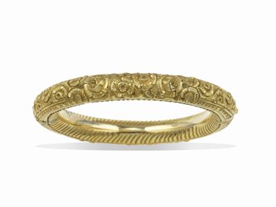 Bracciale rigido, montatura in oro giallo 750/1000