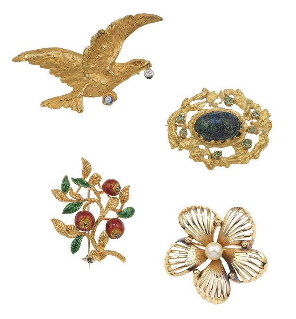 Group of four brooches