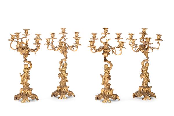 Quattro grandi candelabri a sei fiamme. XIX secolo