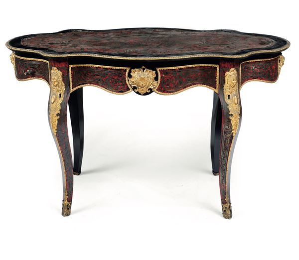 Tavolo ovale in legno ebanizzato e decoro in bronzo e metallo dorato stile Boulle, Francia XIX secolo