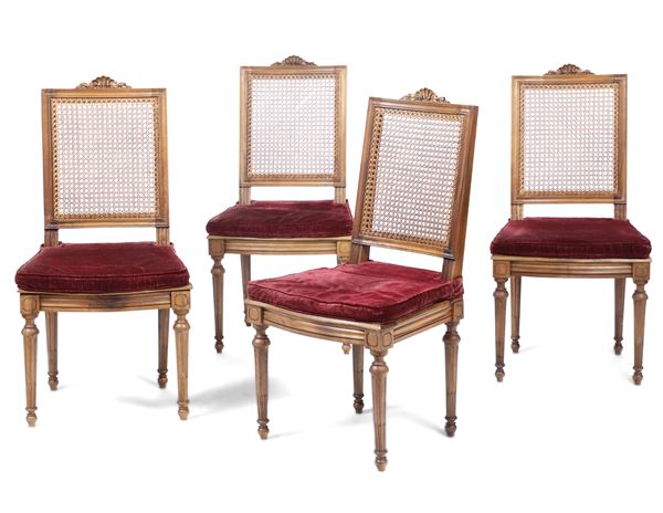 Quattro sedie in legno e cannetè. XX secolo