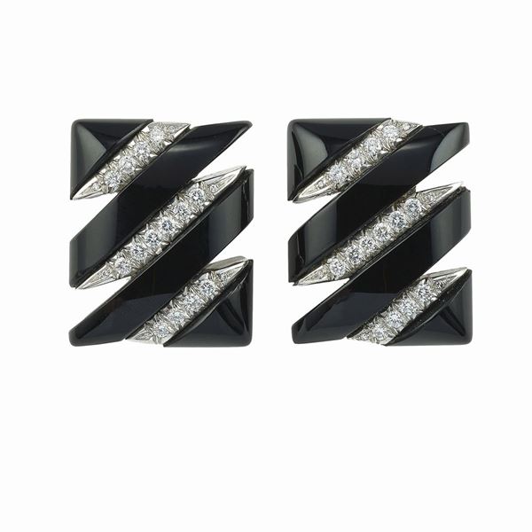 Diamond and onyx earclips. Signed Capello