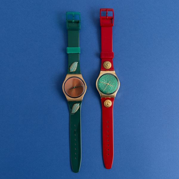 Due orologi Swatch con scatola