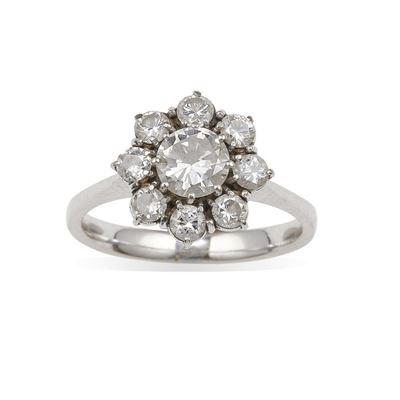 Anello tipo margherita in oro bianco 750/1000 con diamante centrale e diamanti a contorno