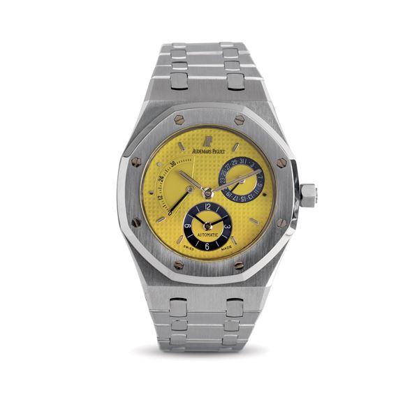 Audemars Piguet - Iconico e ricercato orologio da polso Royal Oak Dual Time "Giallo Ferrari" in acciaio con riserva di carica e indicazione della data accompagnato da scatola ed Estratto d'Archivio 