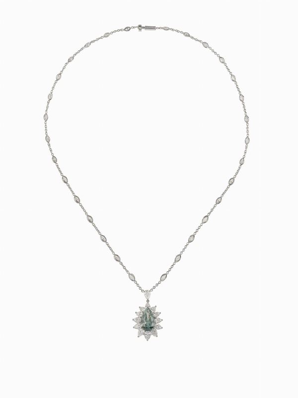 Irradiated fancy diamond and gold pendant