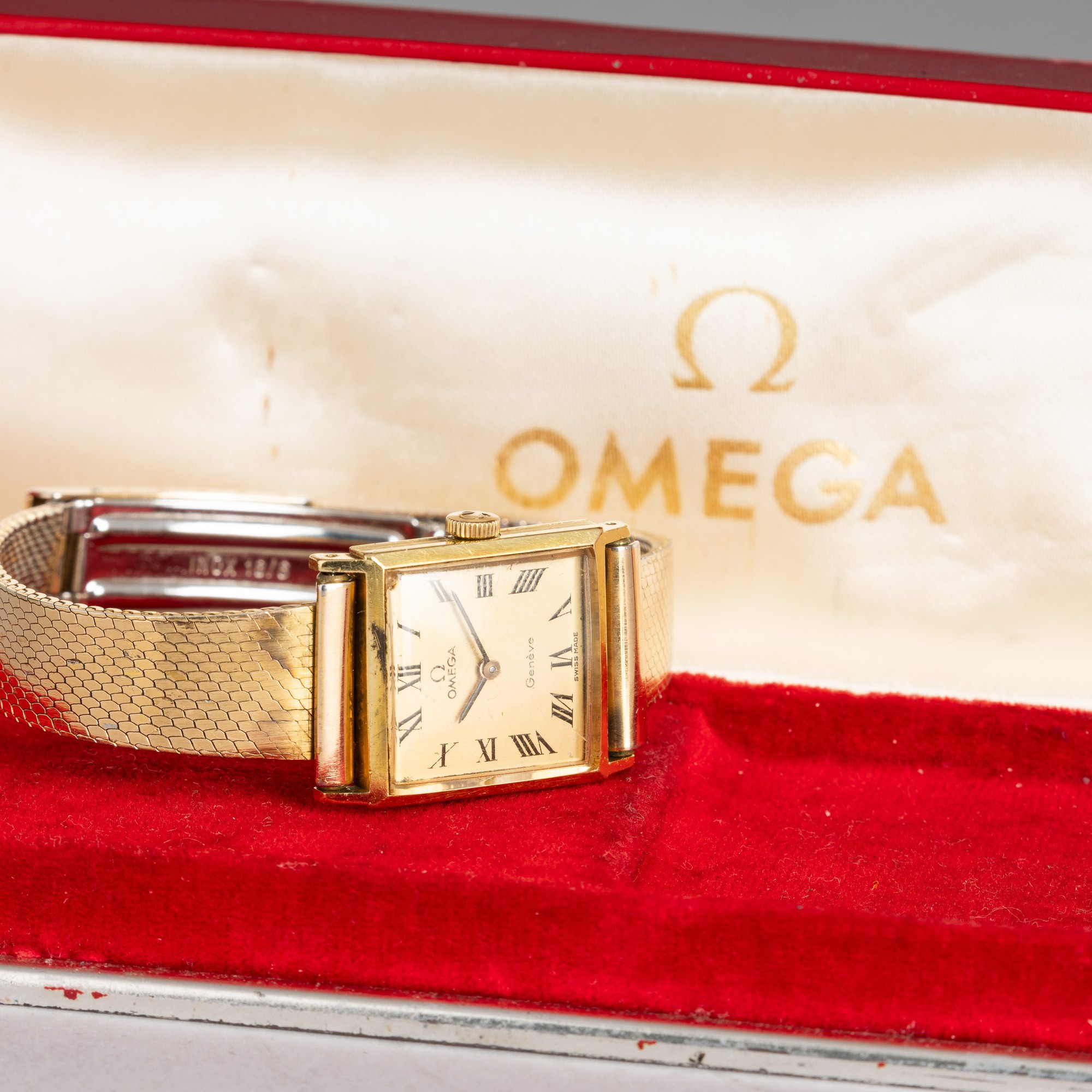 Omega - Lady Rettangolare in Oro Giallo 18k, Bracciale Laminato, Carica Manuale Quadrante Champag...