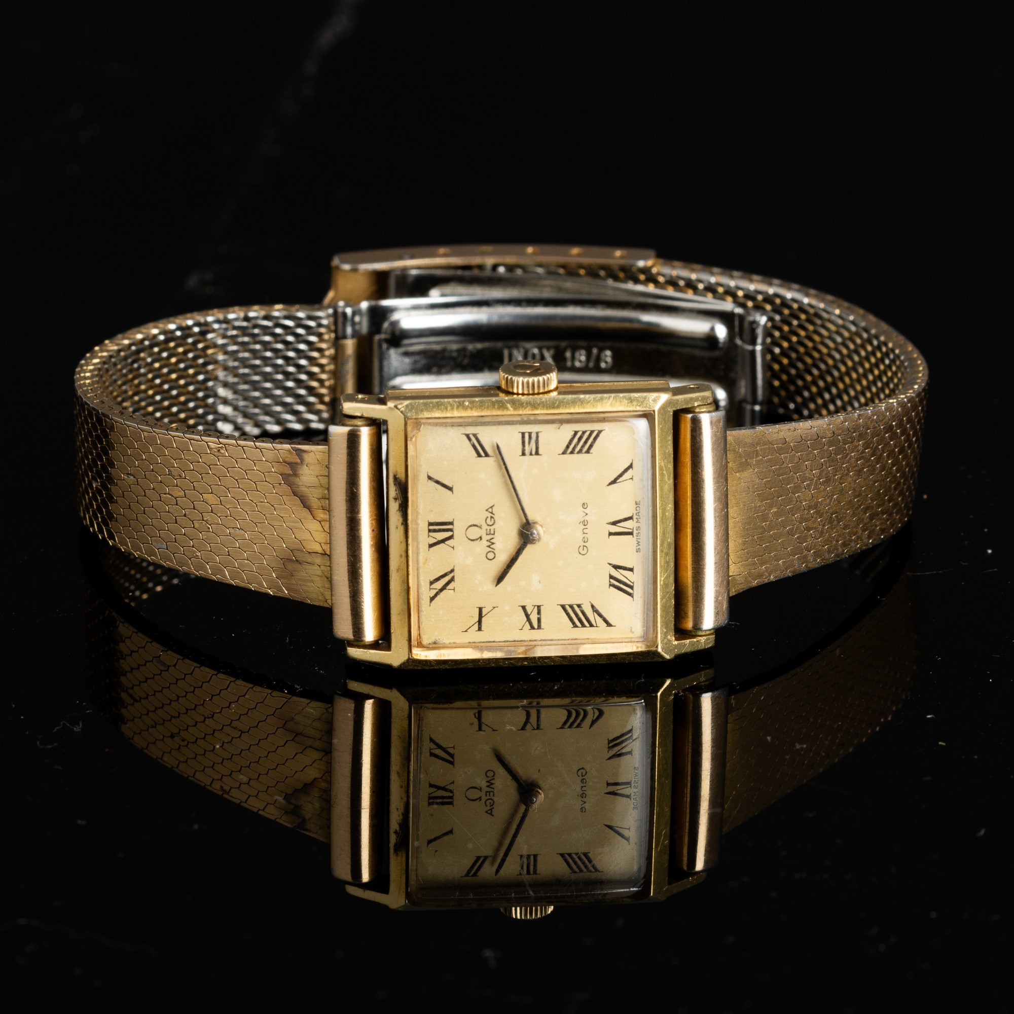 Omega - Lady Rettangolare in Oro Giallo 18k, Bracciale Laminato, Carica Manuale Quadrante Champag...