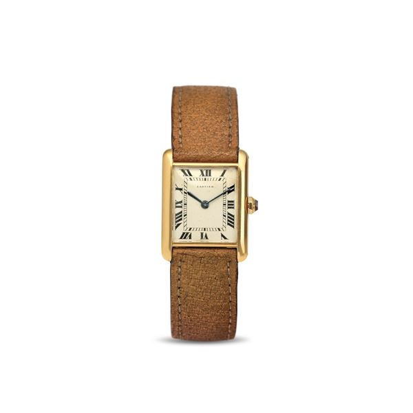 Cartier - Elegant 18k yellow gold hand-wound Tank Louis, dial with Roman numerals, Chemin de Fer minute track and signed Cartier deployant