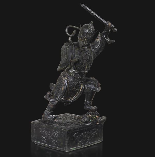 Big dark patinated bronze figure of a warrior, China, Ming Dynasty, 17th century.