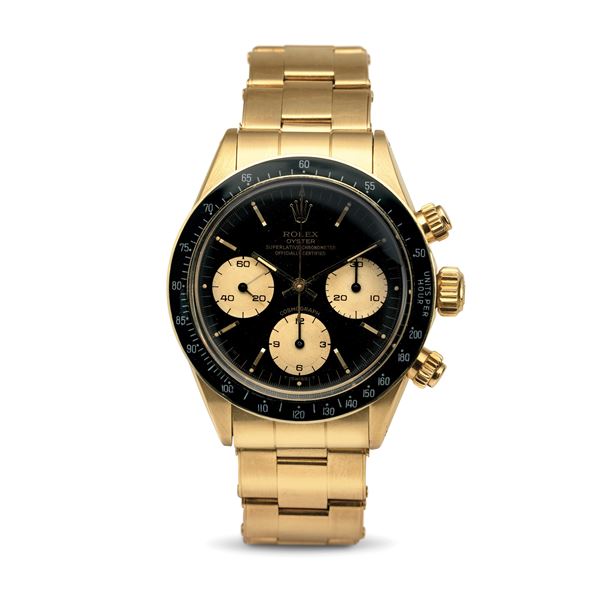Rolex - Exceptional Cosmograph Daytona ref 6263 in 18k yellow gold, black dial with champagne counters, black acrylic bezel, riveted bracelet accompanied by original warranty
