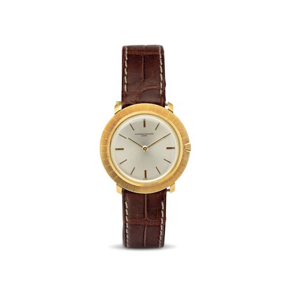 Elegant extra-flat hand-wound Disco Volante in 18k yellow gold, silvered dial with baton hour markers [..]