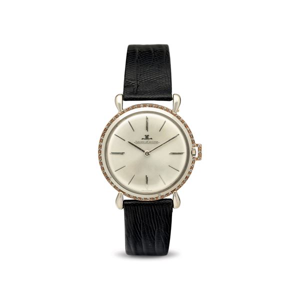 White and rose gold wristwatch with small diamonds, teardrop-shaped lugs, silver dial with extra-flat  [..]
