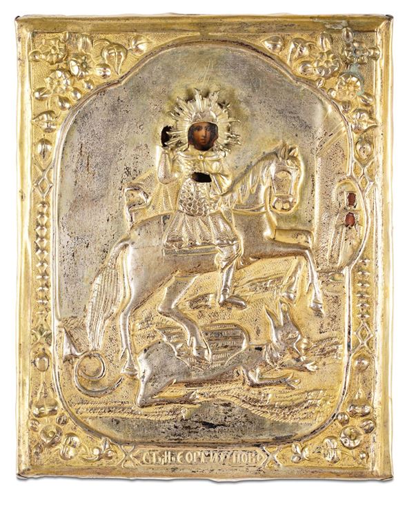San Giorgio. Scuola russa del XIX secolo. Icona su tavola. Riza in rame dorato e argentato (verificare)
