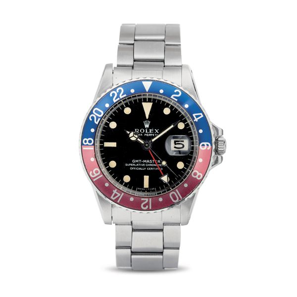 Rolex - GMT Master Pepsi ref 1675 "Long E" in steel with two-tone rotating bezel, matte black dial with pallets, folded Oyster bracelet, accompanied by box, warranty and original purchase invoice