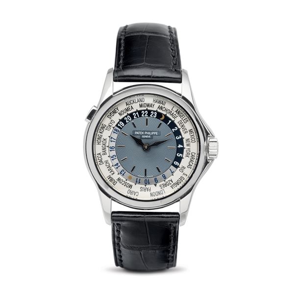 Patek Philippe - Refined and attractive Worldtime ref 5110 P in 950 platinum, light blue dial with circular Guillochè work, rotating 24 time-zone disc operated by push-button at 10 o'clock accompanied by Archive Extract